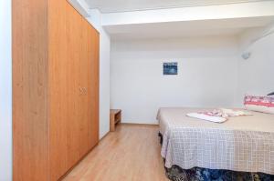 Postel nebo postele na pokoji v ubytování Vila Eliade