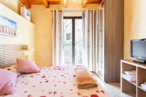 A bed or beds in a room at Mary's House