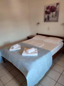 A bed or beds in a room at Litus Amoris
