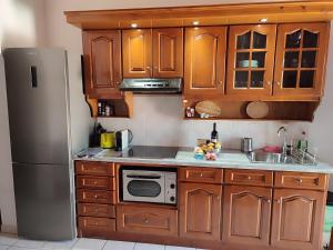 A kitchen or kitchenette at Litus Amoris