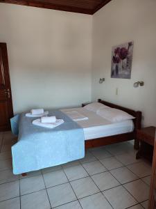 A bed or beds in a room at Litus Amoris