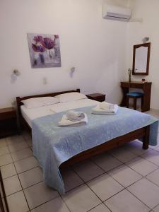 A bed or beds in a room at Litus Amoris