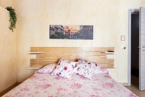 A bed or beds in a room at Mary's House