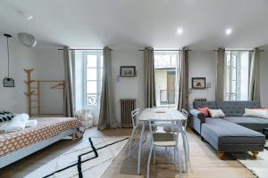 Coin salon dans l'établissement Résidence Aristide Briand - Appartements en Centre Ville