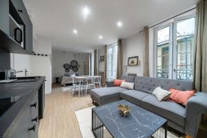Cuisine ou kitchenette dans l'établissement Résidence Aristide Briand - Appartements en Centre Ville