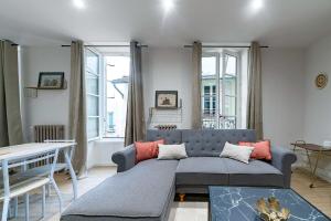 Coin salon dans l'établissement Résidence Aristide Briand - Appartements en Centre Ville
