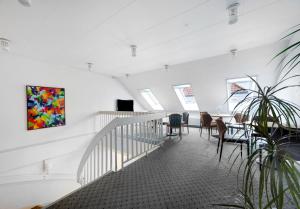 TV a/nebo společenská místnost v ubytování Hotel Søparken