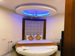 Postel nebo postele na pokoji v ubytování Apex Hotel