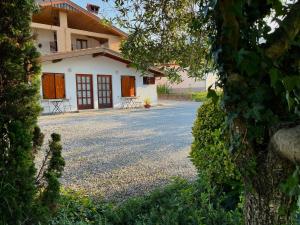 a view of a house from the driveway at Studio Apartma Olive, Nova Gorica, Slovenia in Nova Gorica