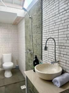 Et badeværelse på Foura House Bali