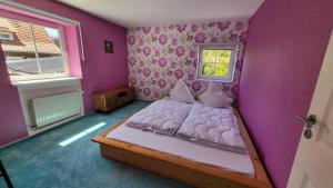 Katil atau katil-katil dalam bilik di Ferienhaus Heart's Home Hahnenklee Harz