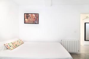 Posteľ alebo postele v izbe v ubytovaní Alohamundi Corral del Rey