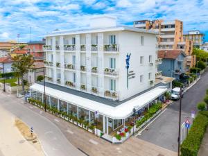 an overhead view of a white building on a street at Hb Hotels Orchidea Blu in Rimini