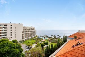 a view of the ocean from the balcony of a resort at Penthouse Vista Mar in Funchal