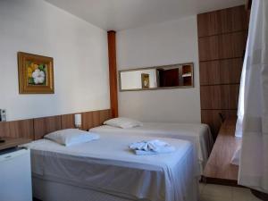 Ένα ή περισσότερα κρεβάτια σε δωμάτιο στο Colle Tourist Hotel LUXO +31 φωτογραφίες