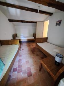 Postel nebo postele na pokoji v ubytování Appart-Hôtel Résidence Maloc