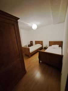 Postel nebo postele na pokoji v ubytování Appart-Hôtel Résidence Maloc