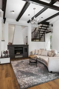 Posezení v ubytování Green Luxury Villa