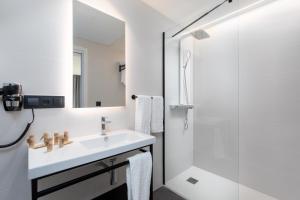 Koupelna v ubytování Arena Zone Hotel