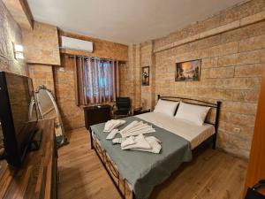 Postel nebo postele na pokoji v ubytování Honeywell Inn