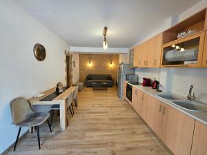 Kuchyň nebo kuchyňský kout v ubytování Honeywell Inn + 6 fotografií