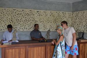 a group of people standing around a counter at Thambapanni Retreat in Unawatuna +37 photos