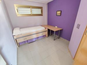 Cama ou camas em um quarto em Vilafortuny Sol Dourada