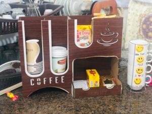 a coffee box with a sign that says no day coffee at Pasha's house 