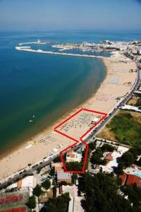 an aerial view of a beach and the ocean at Hotel Vela Velo Club Vieste in Vieste