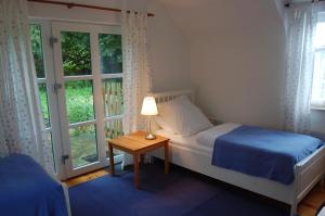 Postel nebo postele na pokoji v ubytování Beaufort Lodge B&B & Cottage