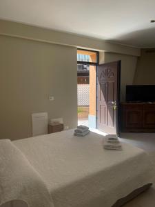 Postel nebo postele na pokoji v ubytování B&B Licia Home