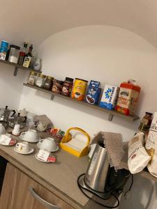 a kitchen counter with a tea kettle on it at La Casetta in Gerace