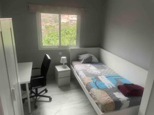 Katil atau katil-katil dalam bilik di Casa Nueva