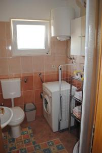 Phòng tắm tại Apartments Kairos - Bili 9