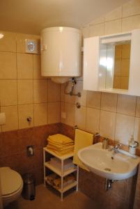 Koupelna v ubytování Apartments Kairos - Bili 9