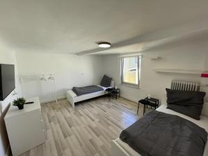 Postel nebo postele na pokoji v ubytování Cozy Apartment in Bad Vilbel