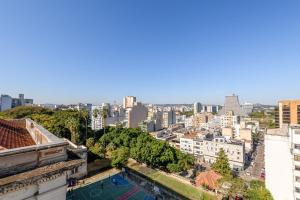 a view of the city from the rooftop of a building at Loft Centro Histórico, Completo e Confortável 502 in Porto Alegre