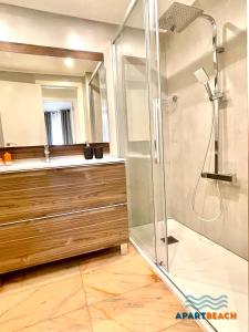 a bathroom with a shower and a sink at APARTBEACH SANCHO ABARCA CENTRICO y JUNTO PLAYA in Salou