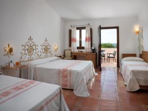 Postel nebo postele na pokoji v ubytování Felix Hotels - Hotel Airone + 37 fotografií
