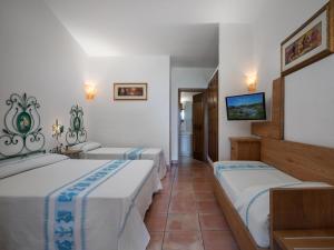Postel nebo postele na pokoji v ubytování Felix Hotels - Hotel Airone