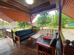 Balkón nebo terasa v ubytování Patcharin Homestay