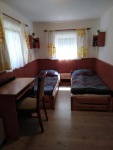 Postel nebo postele na pokoji v ubytování Chata pod Lysou Horou + 7 fotografií