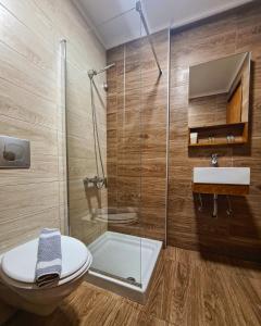 Koupelna v ubytování Abella Hotel