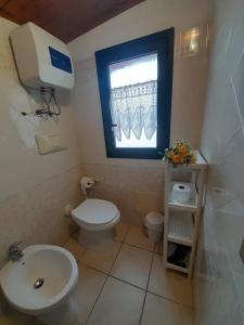 Um banheiro em Casa Giola