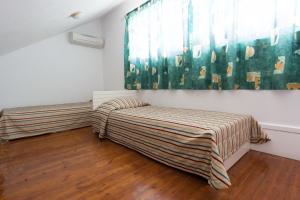 Postel nebo postele na pokoji v ubytování Markakis Apartments