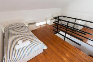 Postel nebo postele na pokoji v ubytování Markakis Apartments