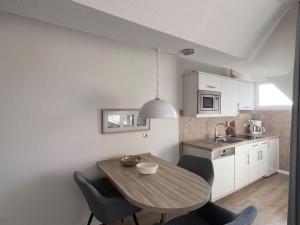 Η κουζίνα ή μικρή κουζίνα στο Luna-Wohnung-35 +14 φωτογραφίες