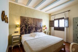 Cama o camas de una habitación en YIT La Casona del Arco