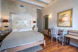 Cama o camas de una habitación en YIT La Casona del Arco