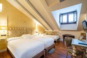 Cama o camas de una habitación en YIT La Casona del Arco